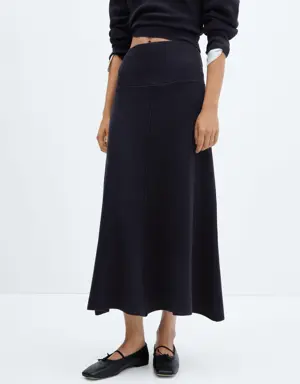 Flared knit skirt with decorative seams