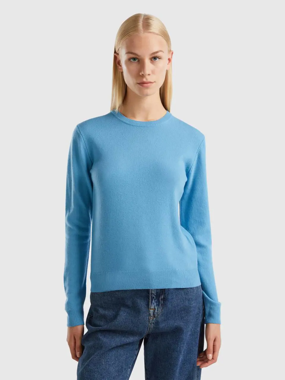 Benetton light blue crew neck sweater in merino wool. 1