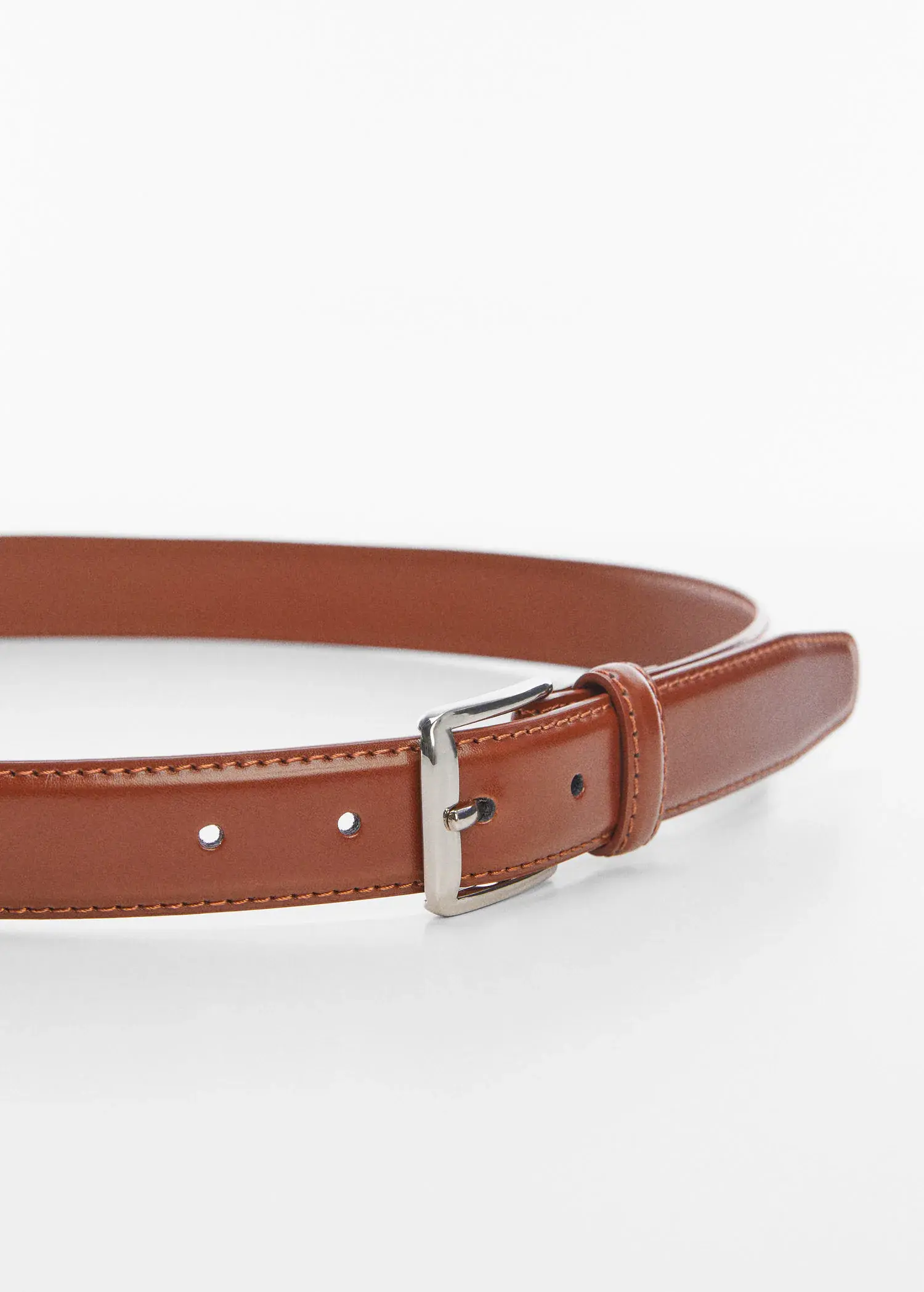 Mango Leather belt. a close-up of a brown leather belt with a silver buckle. 