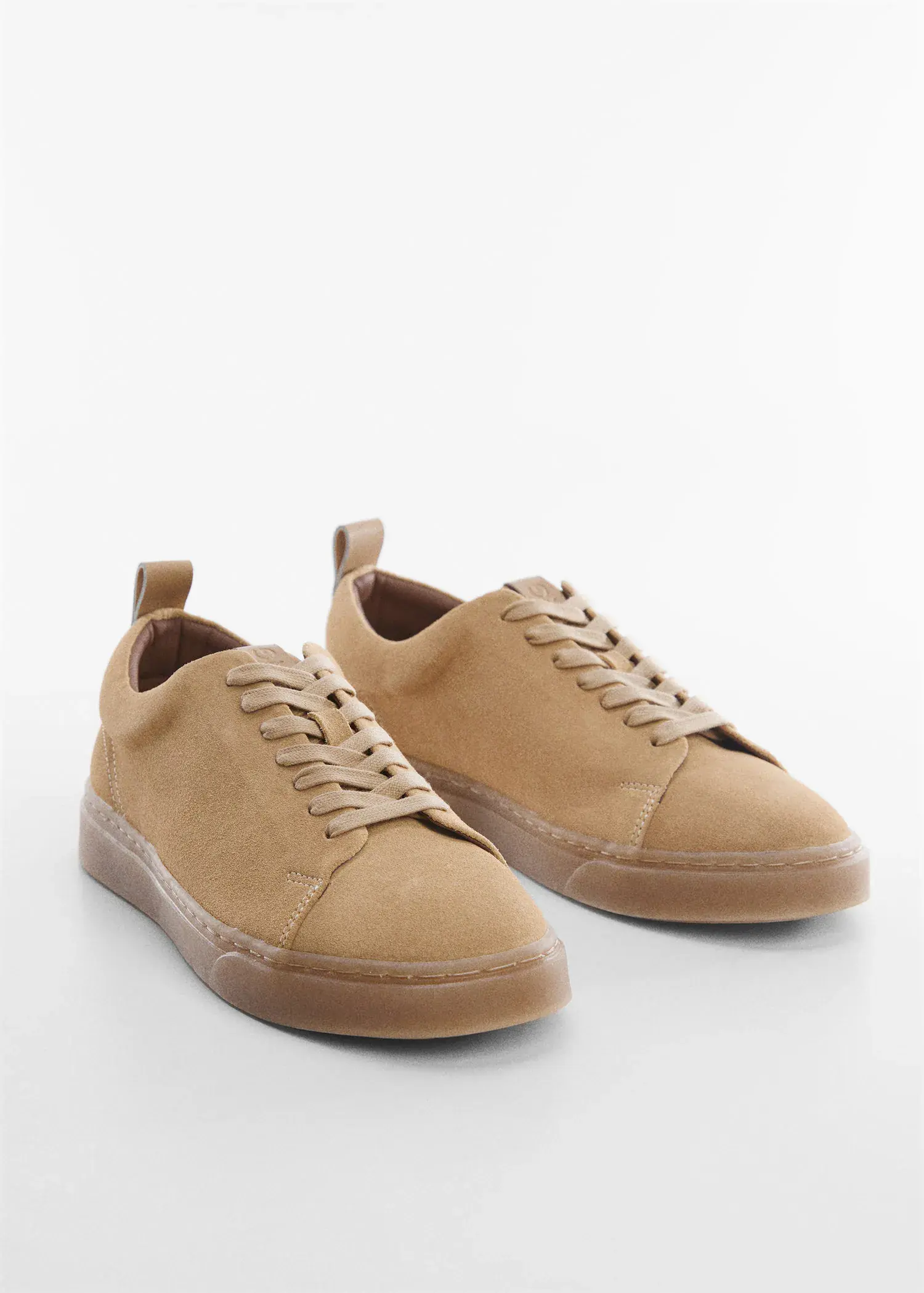 Mango Suede trainers. a pair of tan sneakers on a white surface. 