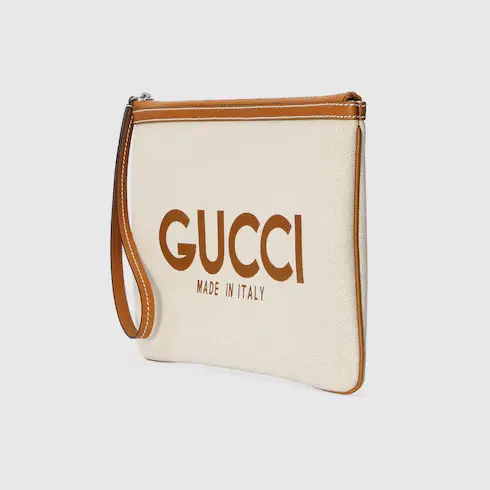 Gucci Clutch with Gucci print. 2