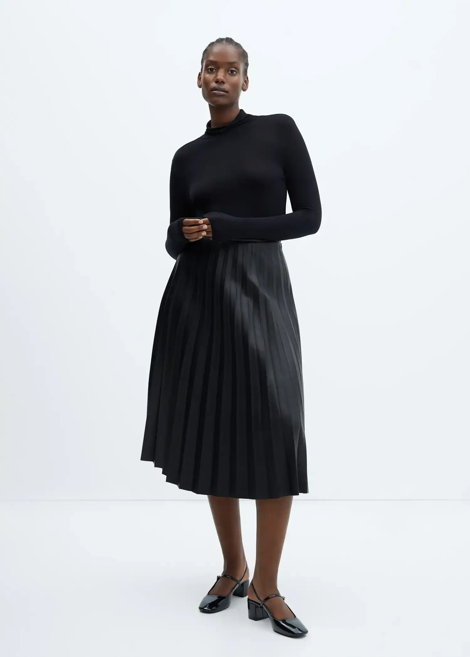 Mango Leather-effect pleated skirt. 1