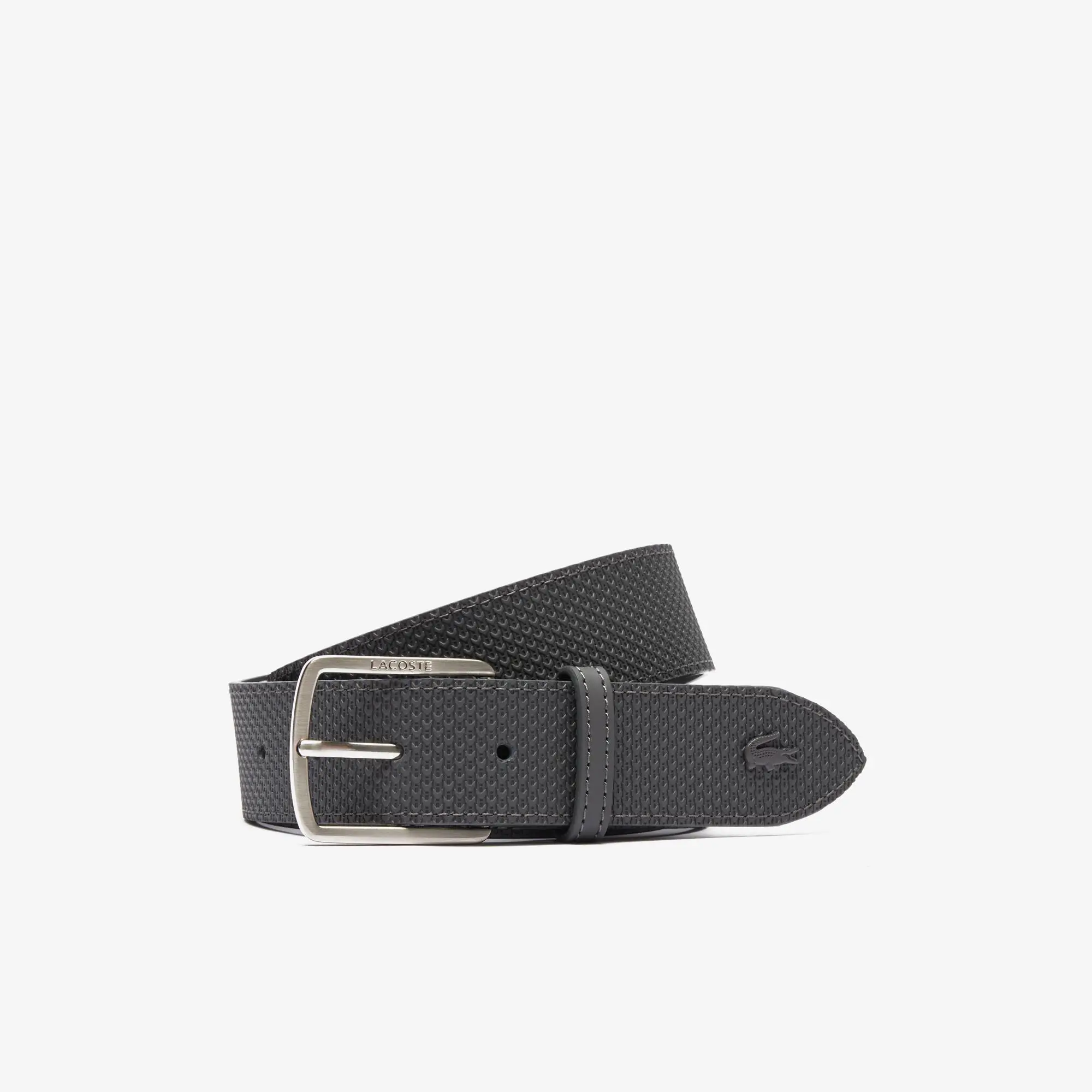 Lacoste Herren-Gürtel aus strukturiertem Leder mit gravierter Schnalle. 1 Lacoste Herren-Gürtel aus strukturiertem Leder mit gravierter Schnalle. 1