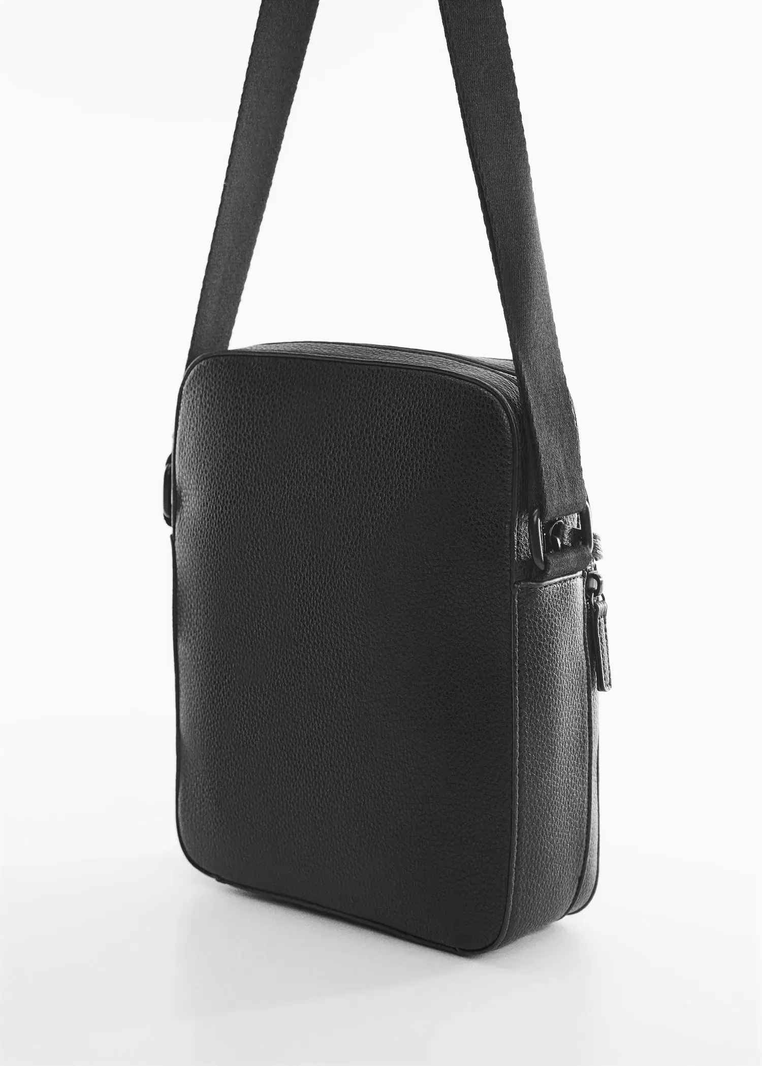 Mango Leather-effect shoulder bag. a black bag is shown on a white surface. 