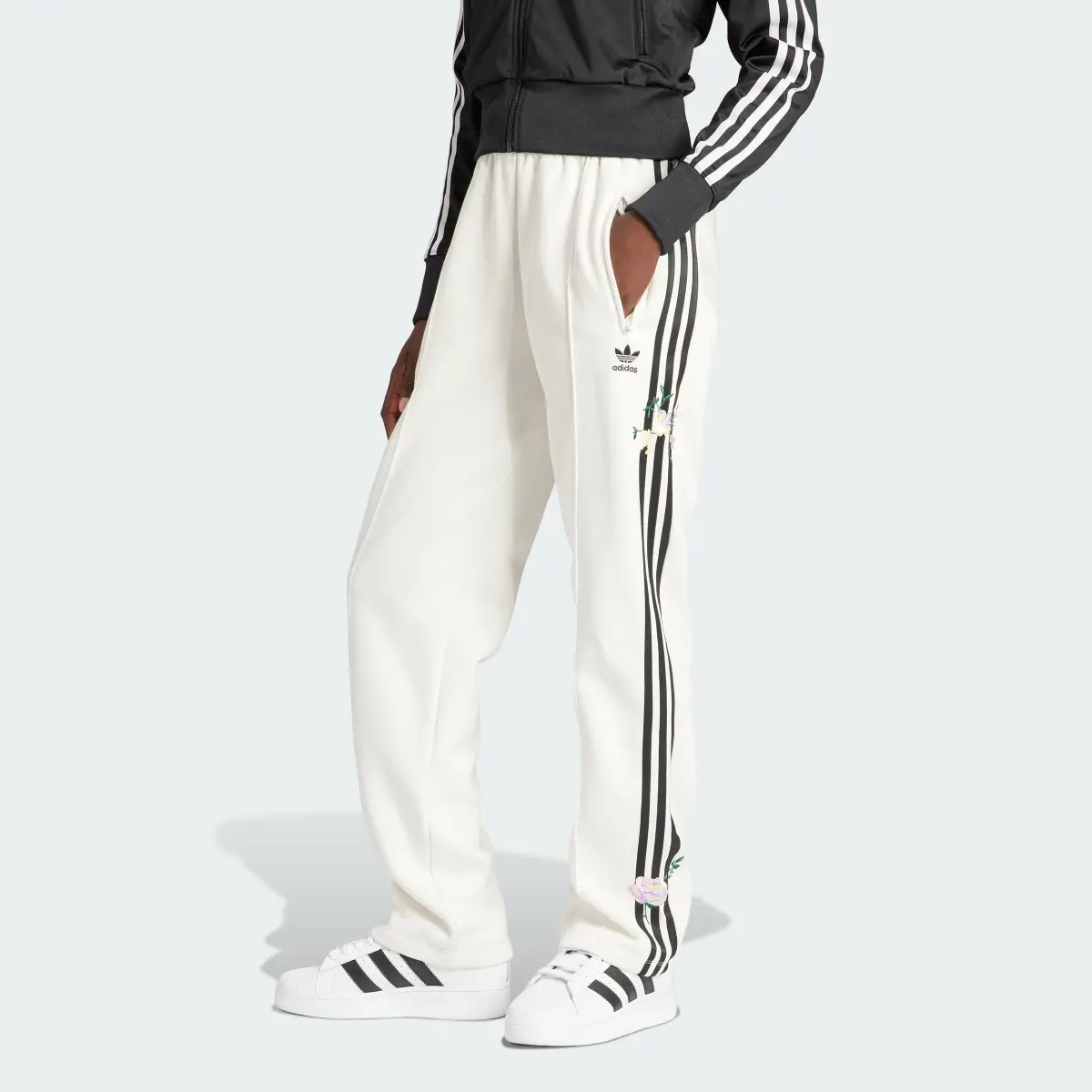 Adidas Embroidered Flower Pants. 1