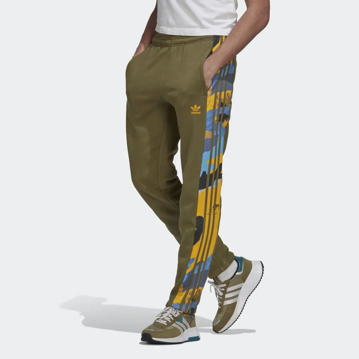 Adidas Pantalon de survêtement Camo Series. 1