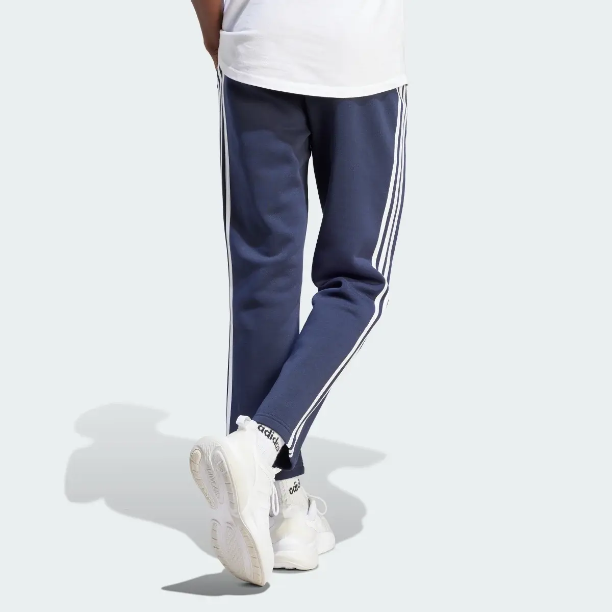 Adidas Essentials 3-Stripes Open Hem Fleece Pants. 2