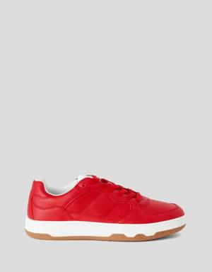 Red low-top sneakers