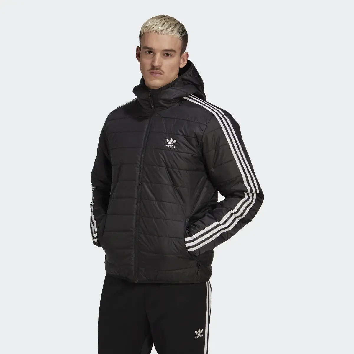 Adidas Chaqueta acolchada con capucha Puffer. 2