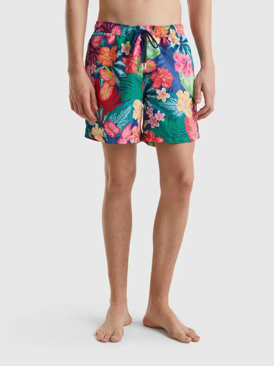 Benetton swim trunks with floral print. 1