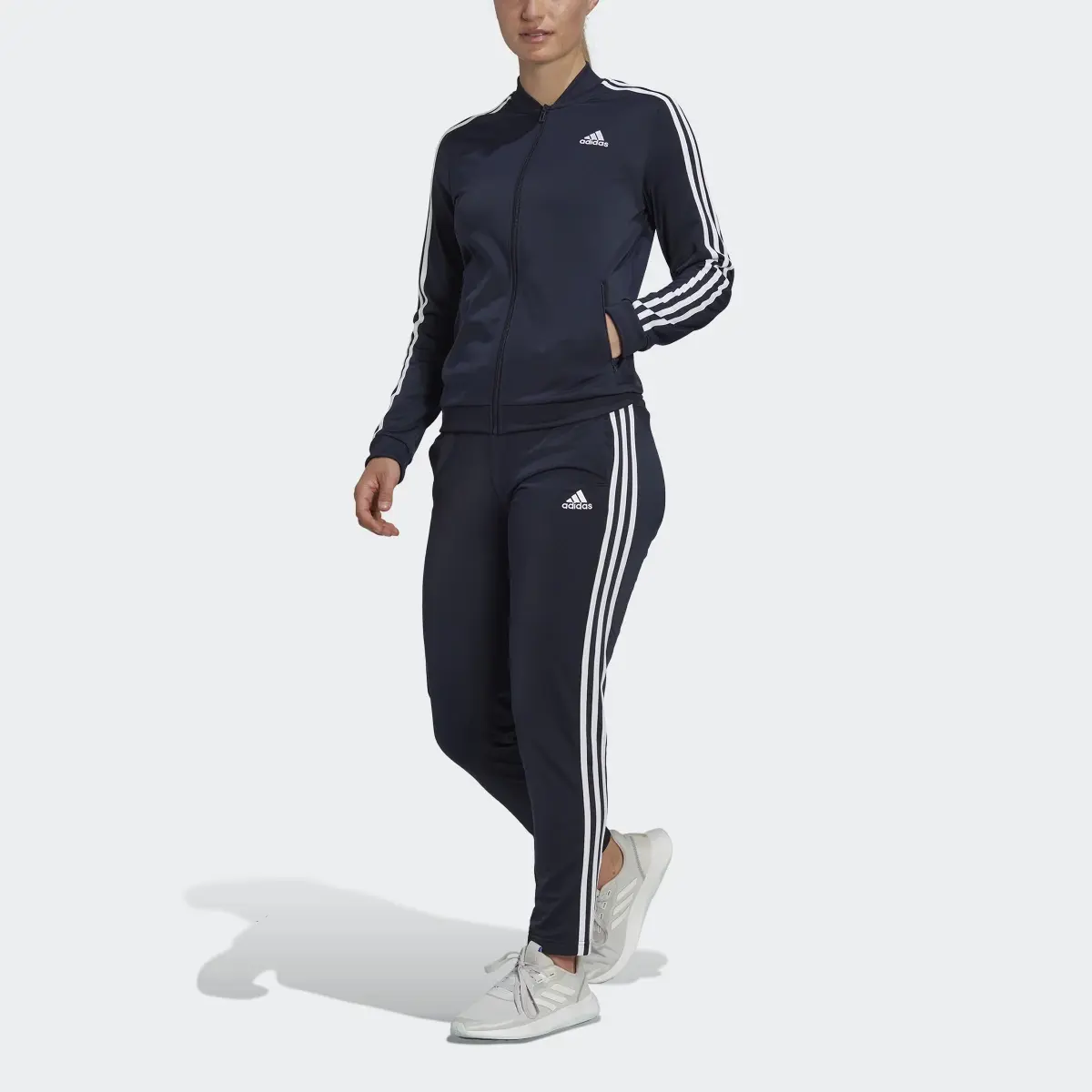 Adidas Essentials 3-Stripes Track Suit. 1