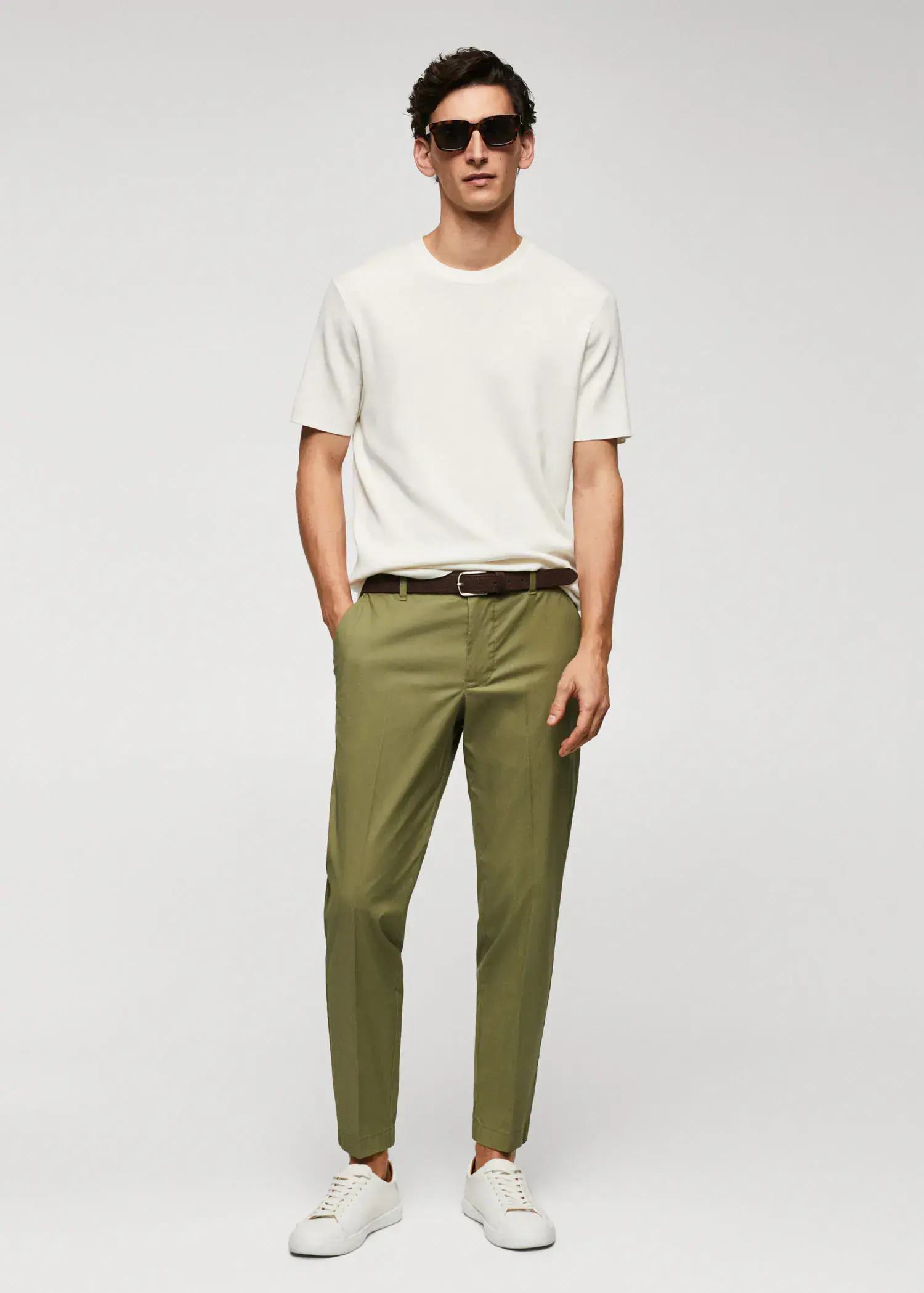 Mango Slim-fit cotton trousers. a man in a white shirt and green pants. 