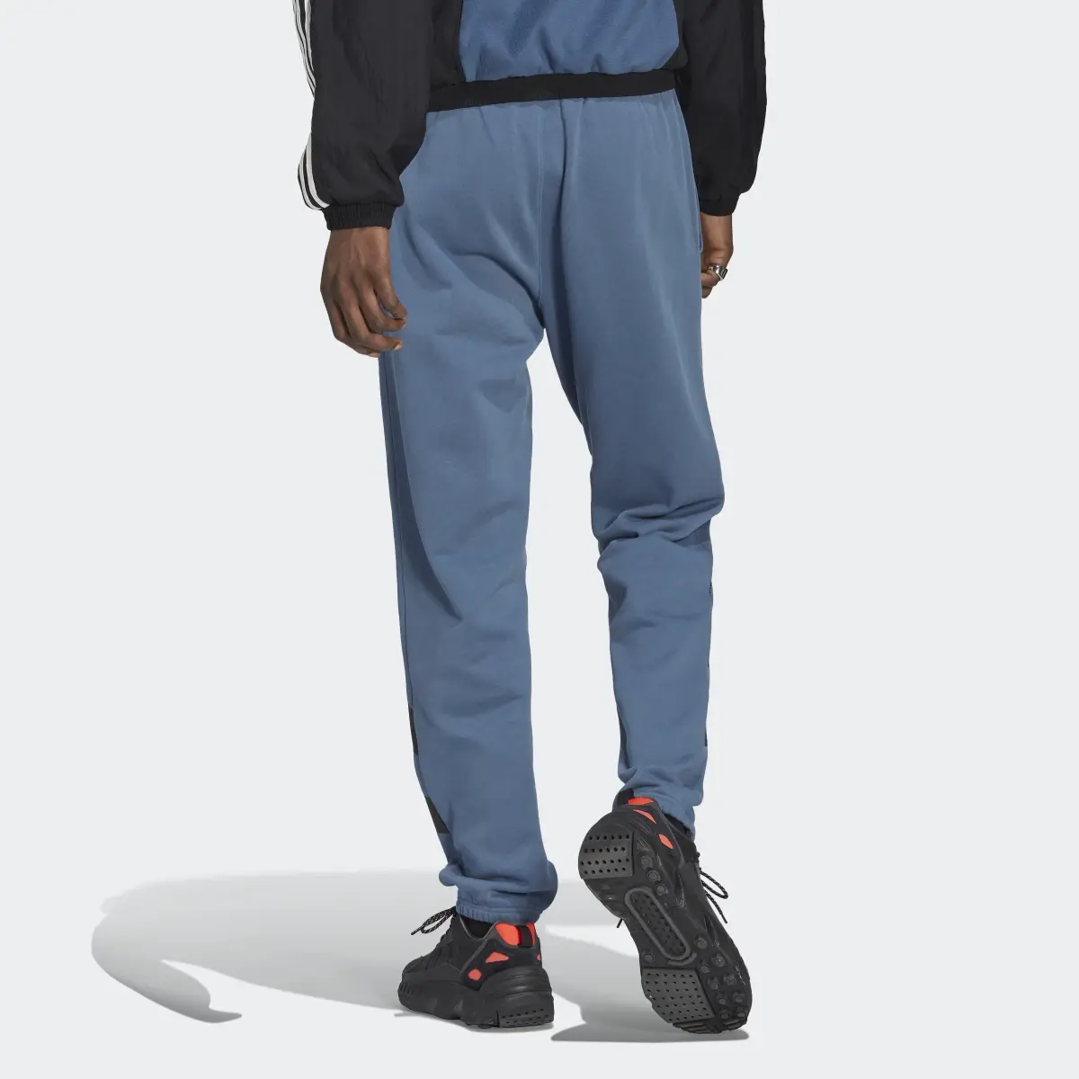 Adidas Rekive Placed Graphic Joggers. 3
