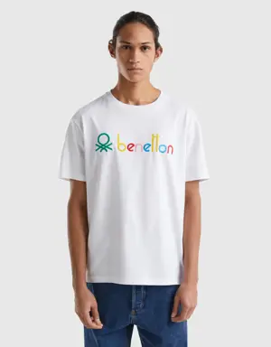 white t-shirt with multicolored logo