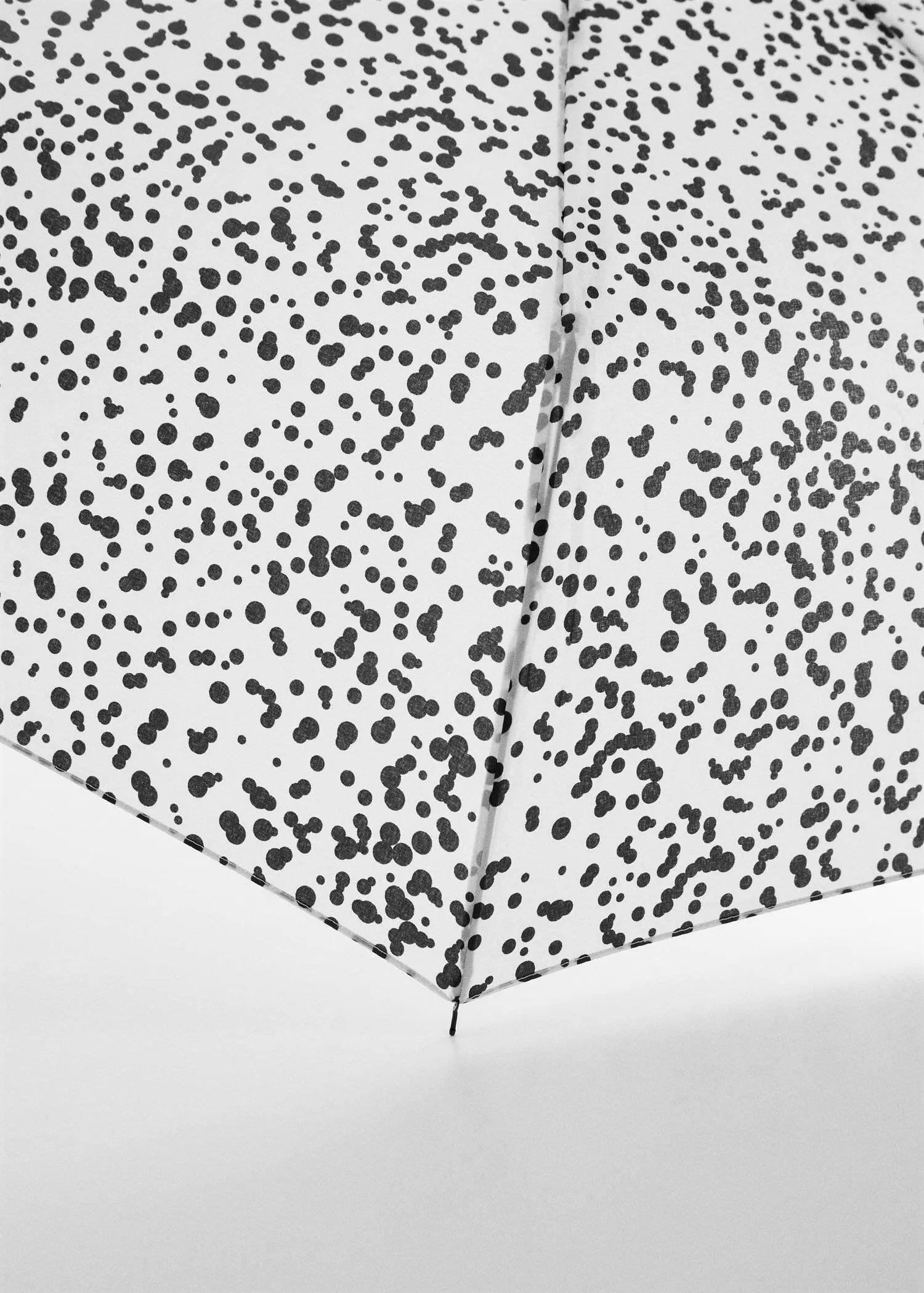 Mango Print folding umbrella. a close up of a black and white umbrella. 