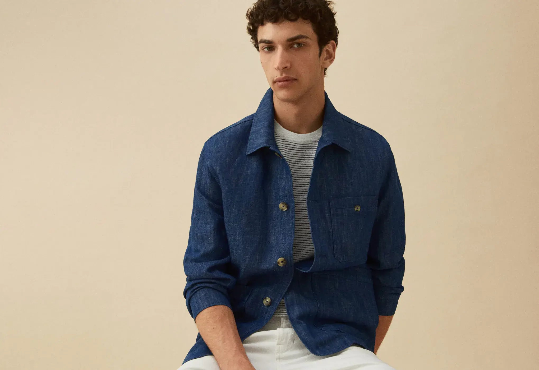 Mango Cotton-linen jacket with pockets. a young man wearing a blue shirt and white shirt. 