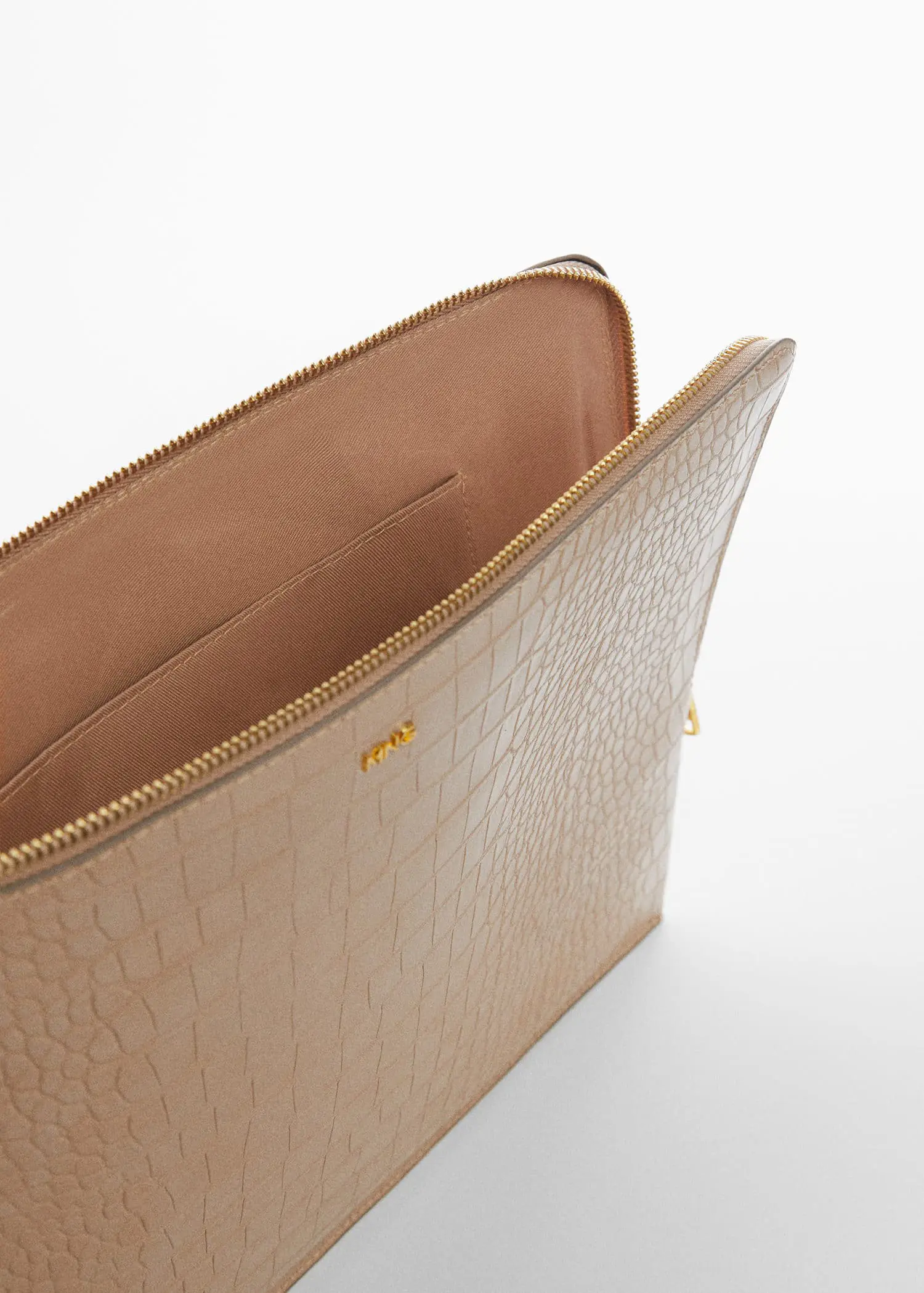 Mango Coco laptop case. a close-up view of the inside of a bag. 