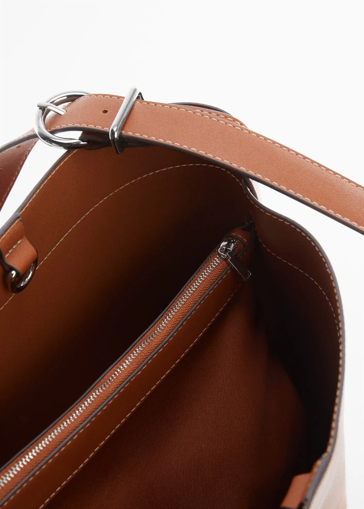 Mango Short handle shopper bag. a close-up view of the inside of a purse. 