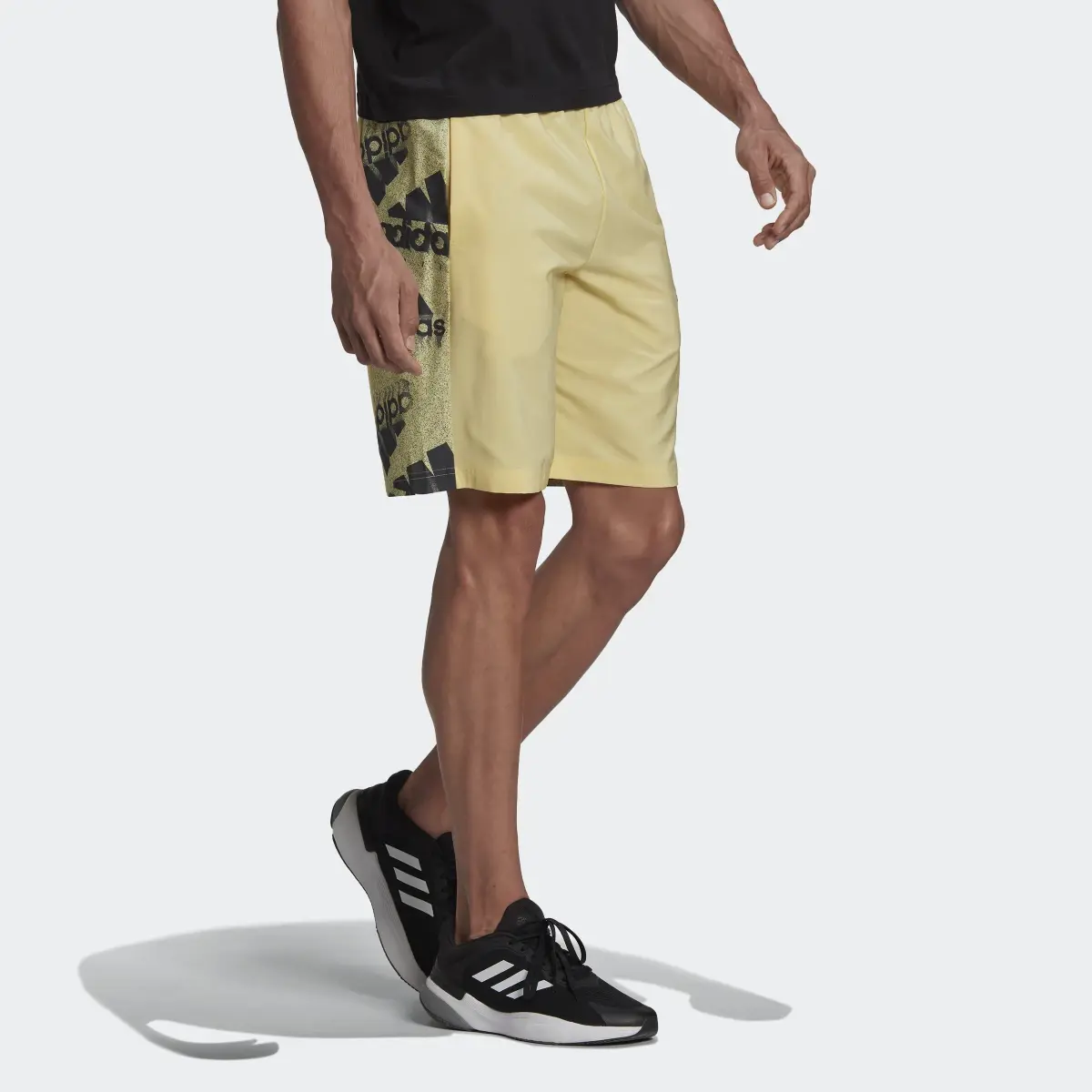 Adidas Essentials BrandLove Woven Shorts. 3