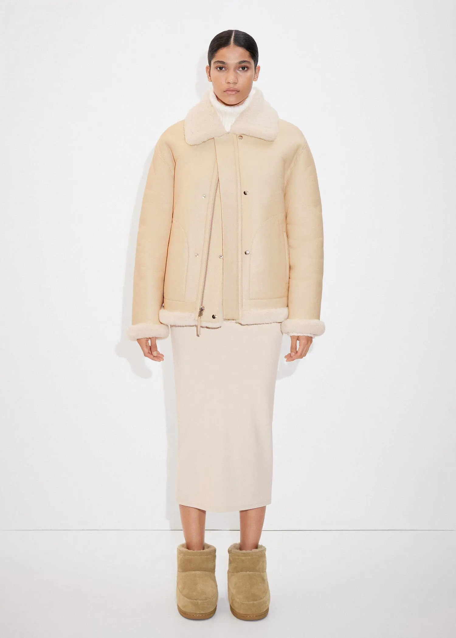 Mango Reversible leather and fur-effect coat. 3