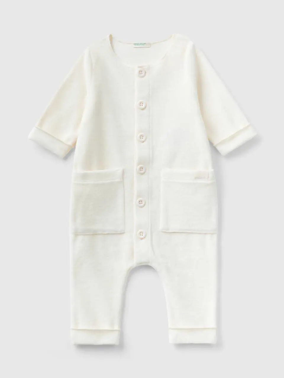 Benetton onesie in chenille with pockets. 1