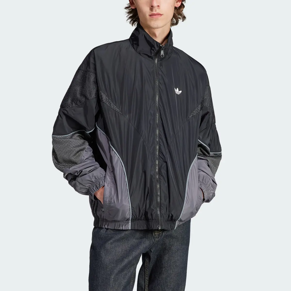 Adidas Rekive Woven Track Top. 1