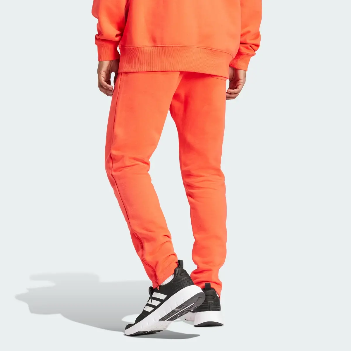 Adidas ALL SZN Fleece Tapered Leg Zip Pants. 2