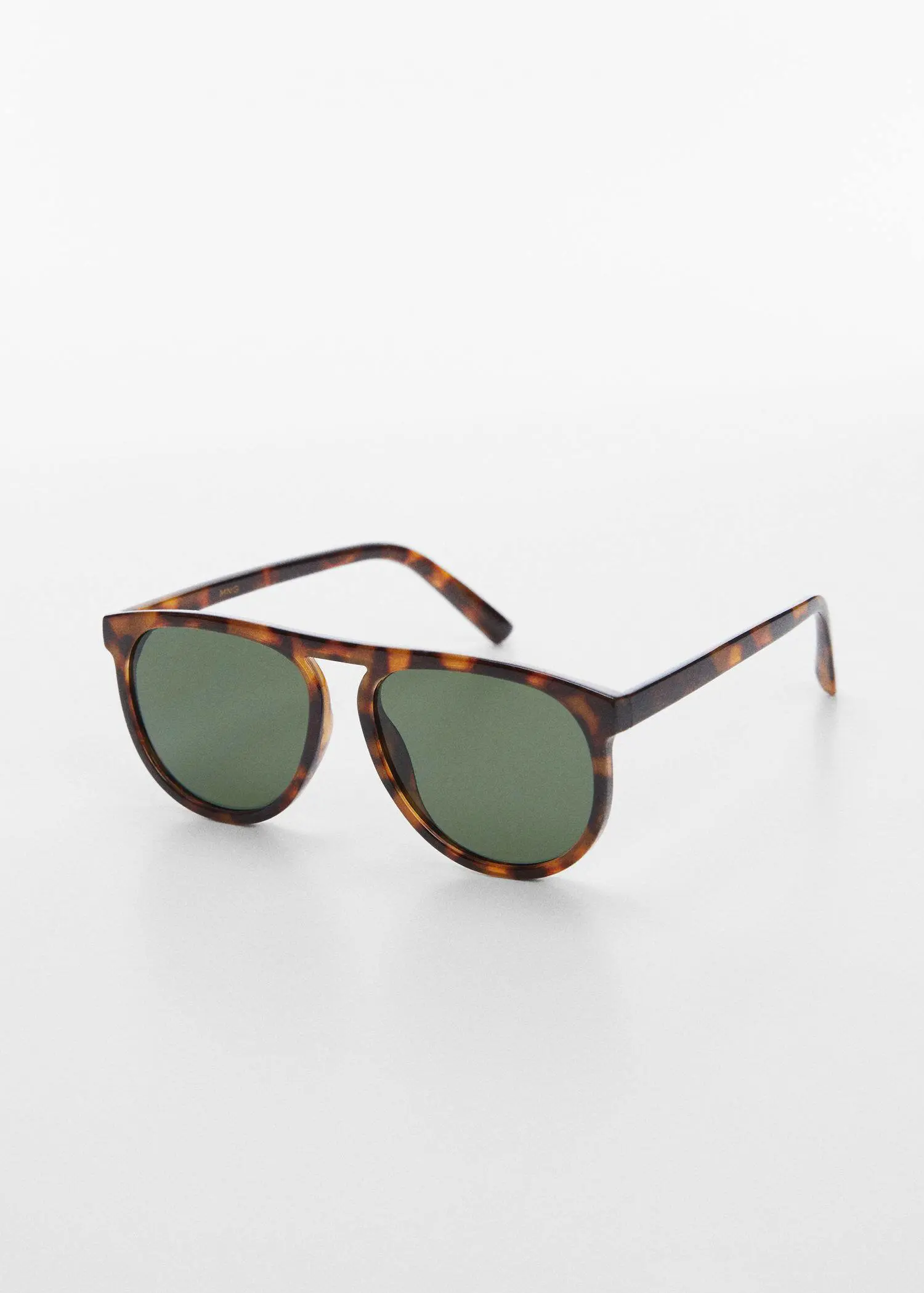 Mango Polarised sunglasses. a pair of sun glasses on a white surface 