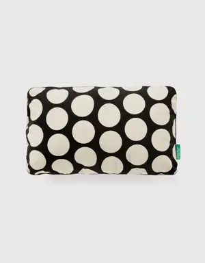 rectangular pillow with white polka dots