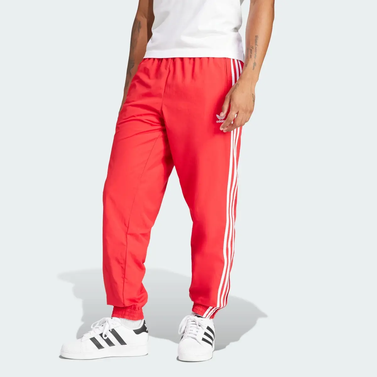 Adidas Adicolor Woven Firebird Track Pants. 1