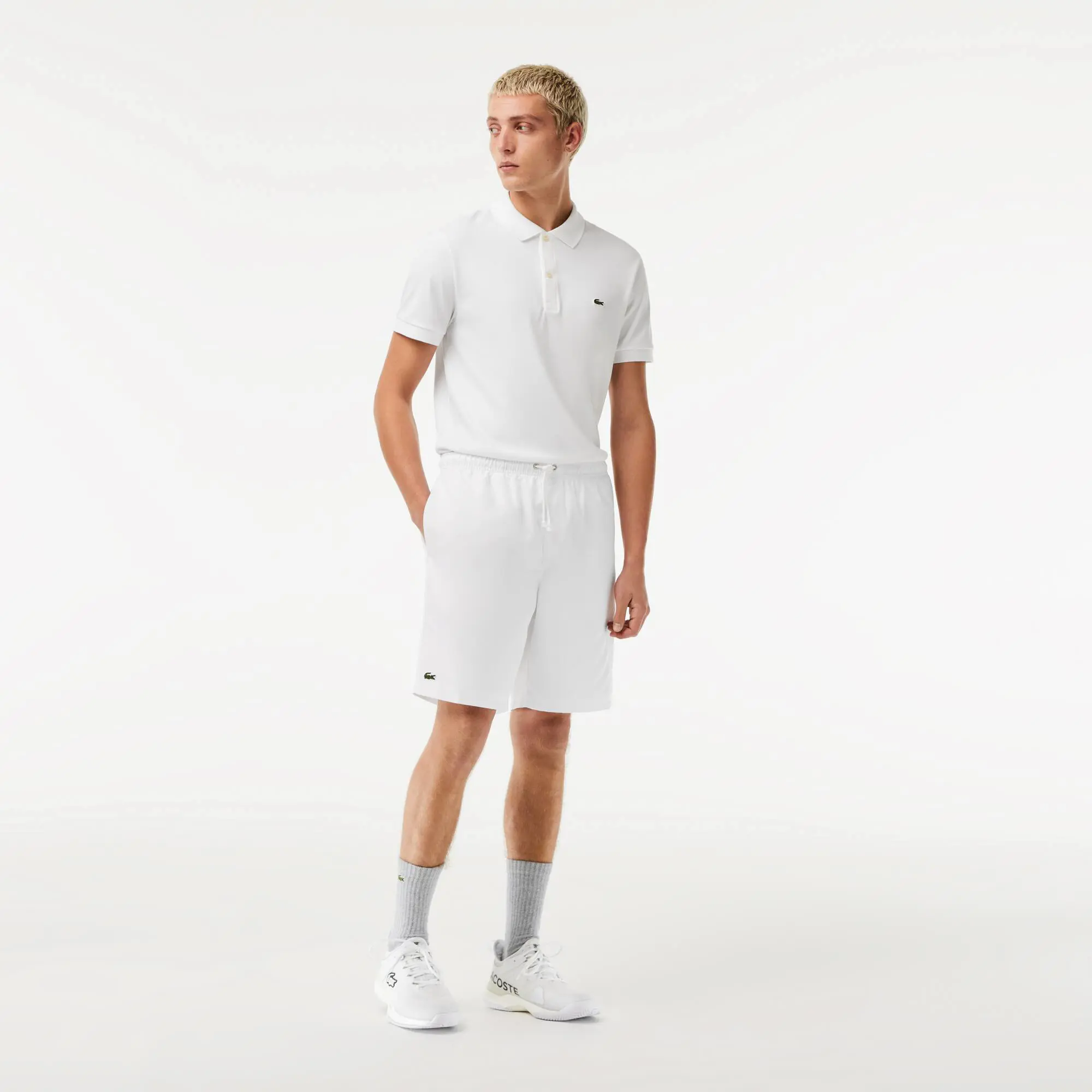 Lacoste Men's SPORT Tennis Solid Diamond Weave Shorts. 1