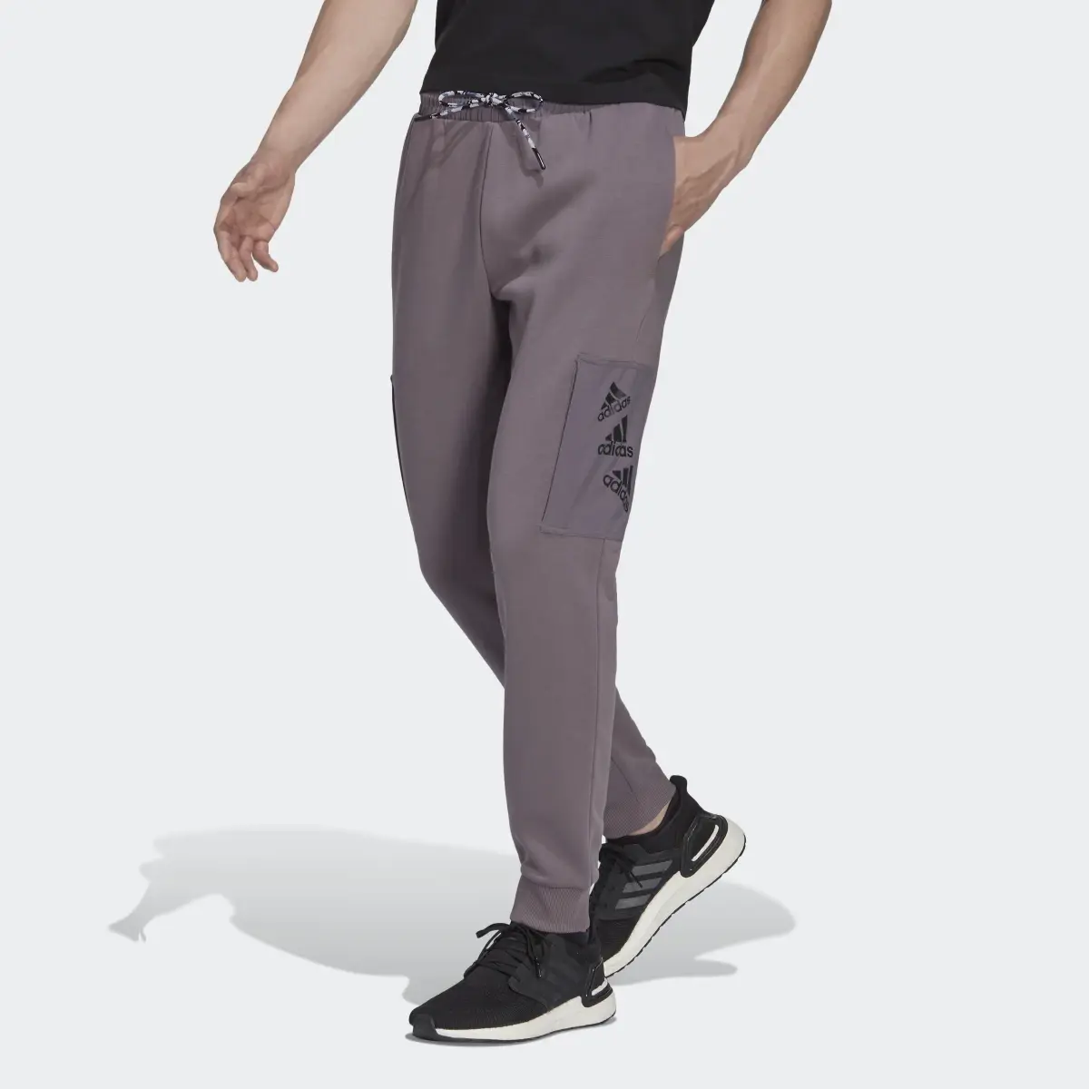 Adidas Essentials BrandLove Fleece Pants. 1