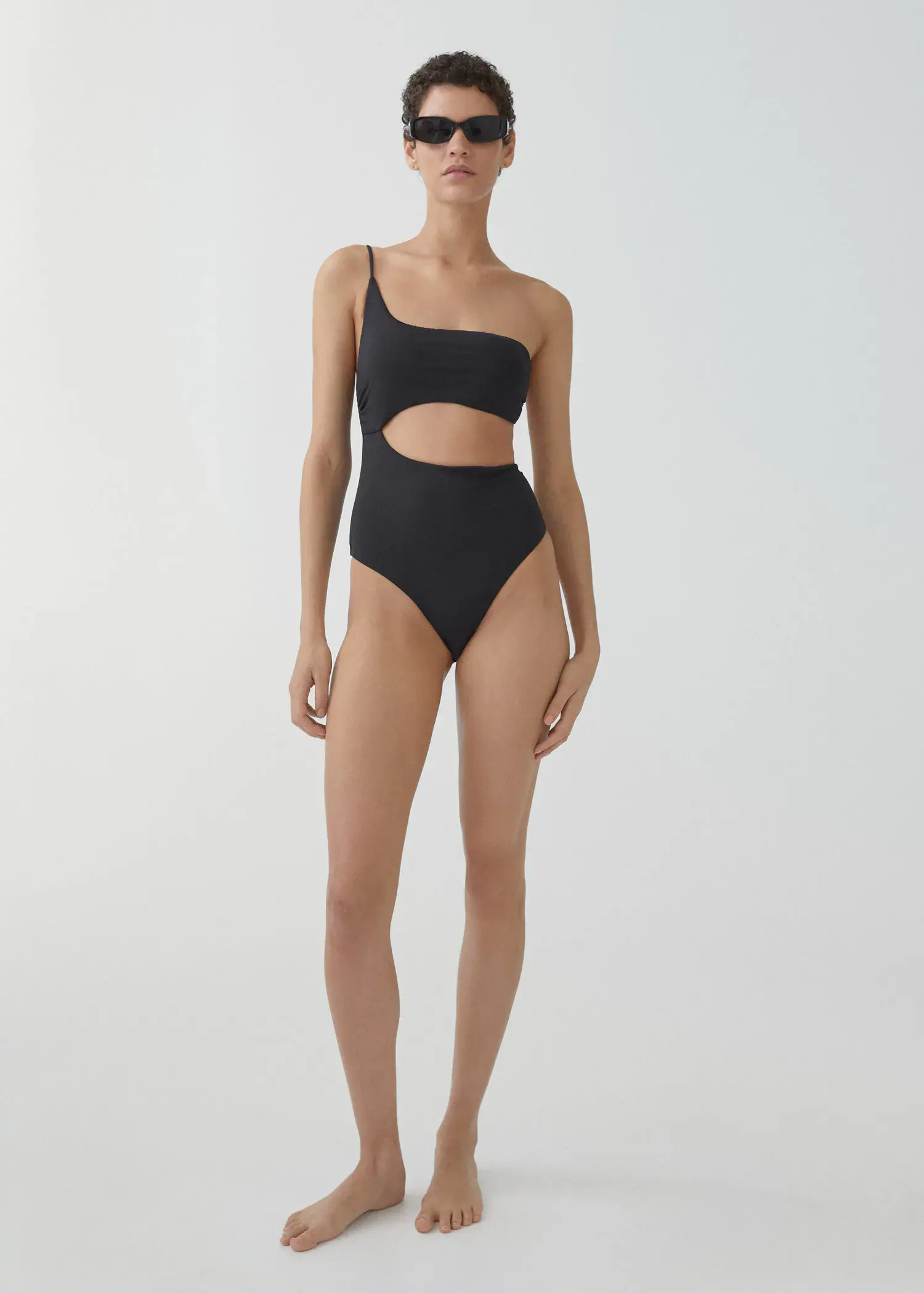 Mango Swimsuit with asymmetrical opening. 2