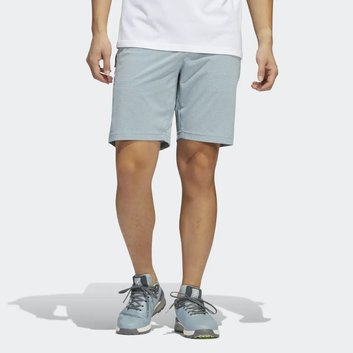 Adidas Adicross Futura Golf Shorts. 1