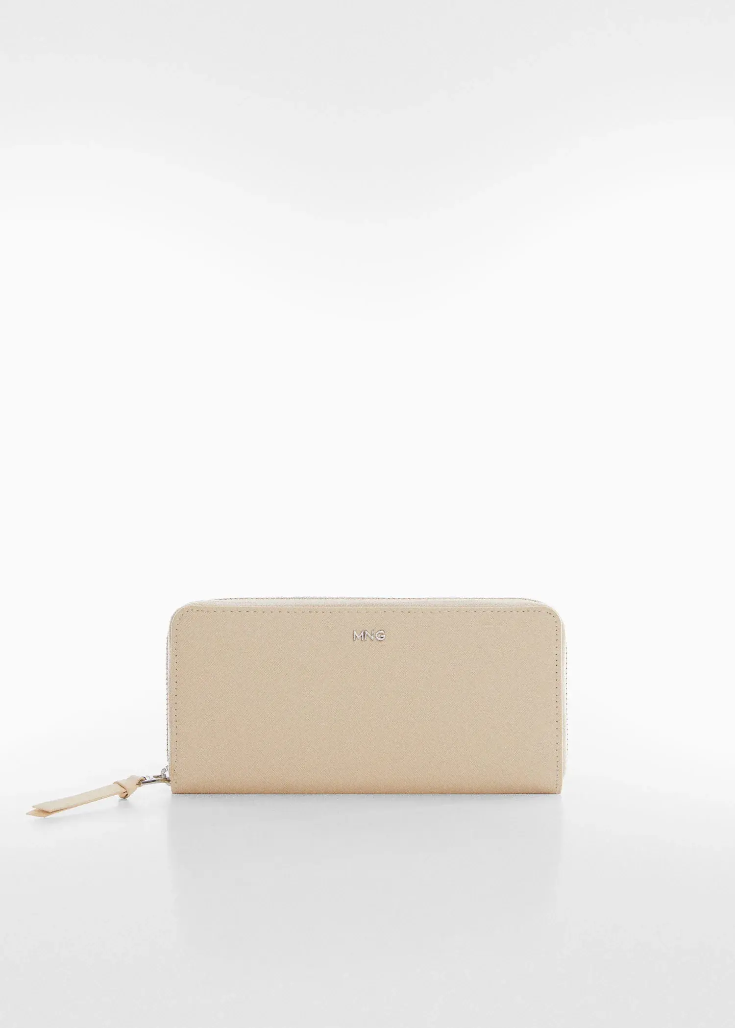 Mango Saffiano-effect wallet. a beige purse sitting on top of a table. 