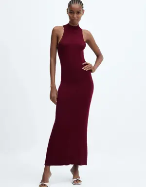 Fitted dress with back slit