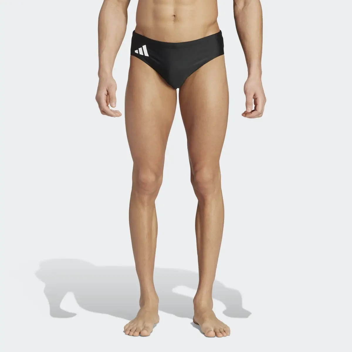 Adidas Solid Swim Trunks. 1