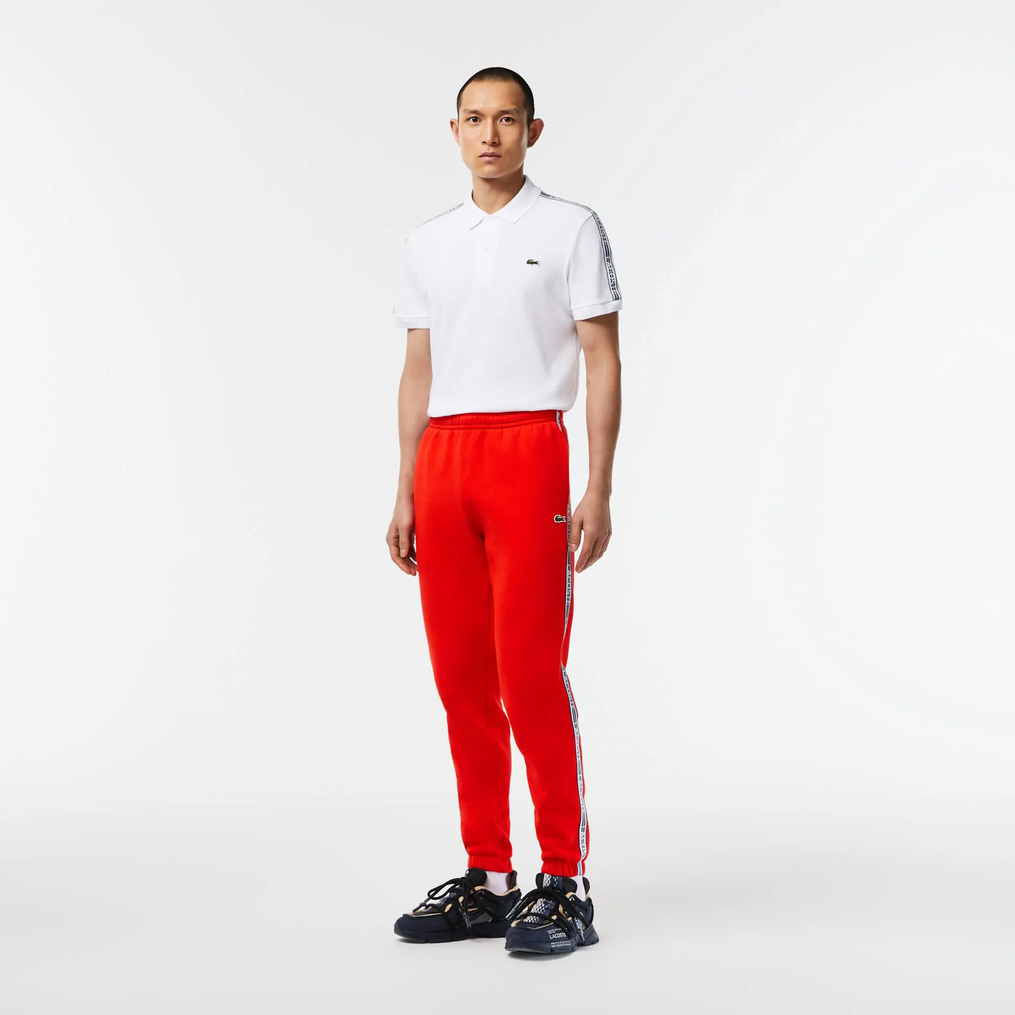 Lacoste Pantalon de survêtement Jogger homme Lacoste avec bandes siglées. 1