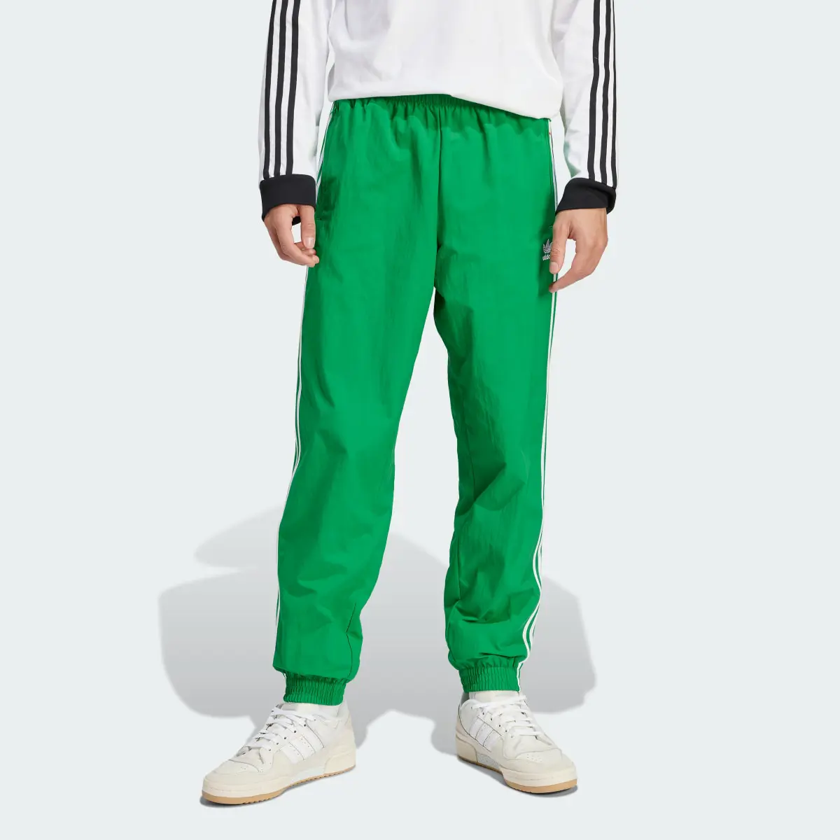 Adidas Adicolor Woven Firebird Track Pants. 1