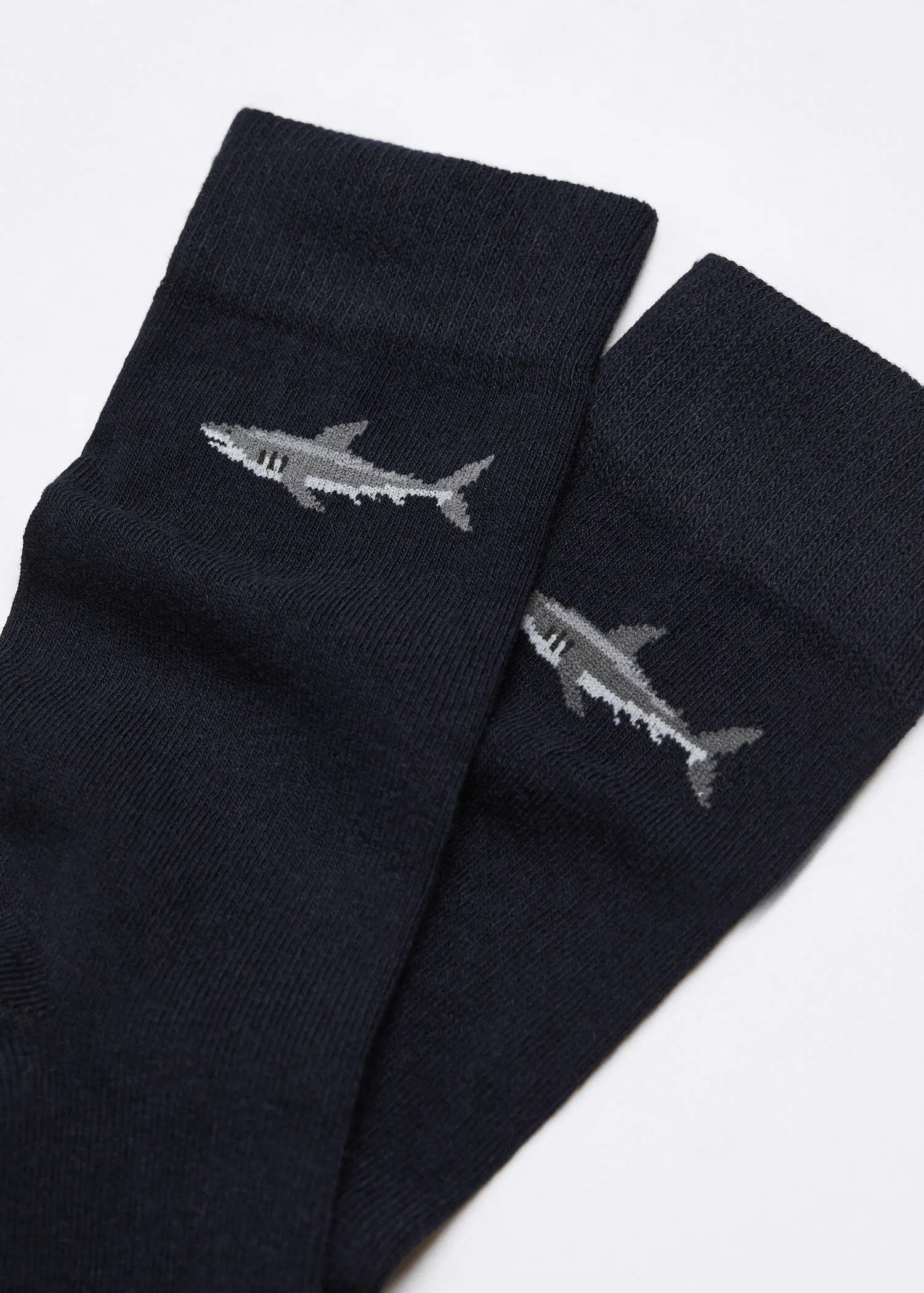Mango Shark-embroidered cotton socks. a pair of black socks with a picture of a shark. 