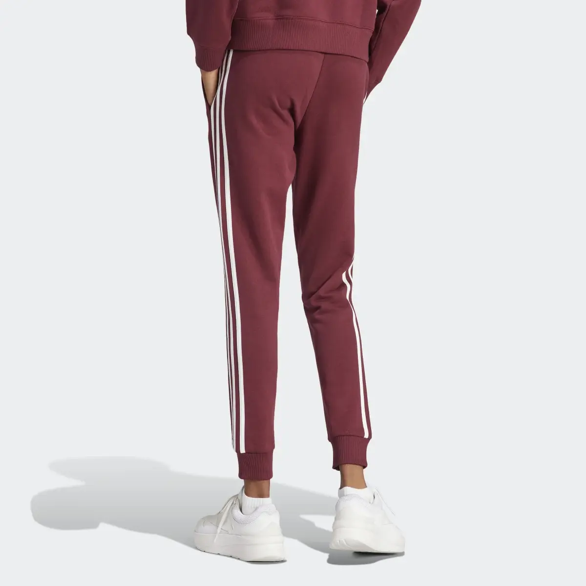 Adidas Essentials 3-Stripes French Terry Cuffed Pants. 2