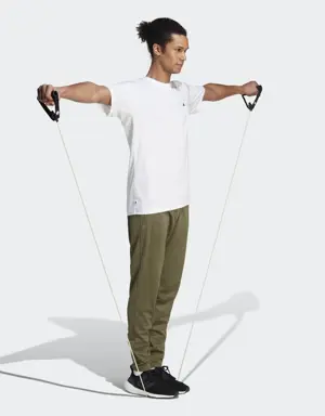Adidas Pantaloni da allenamento Train Essentials Seasonal Woven. 3