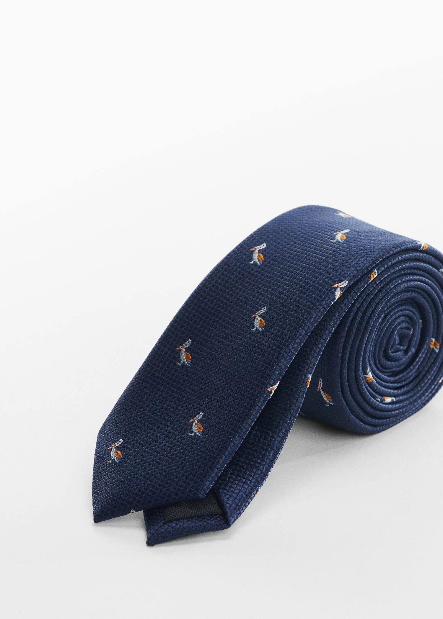 Mango Tie with animals print . a close up of a tie on top of a table 