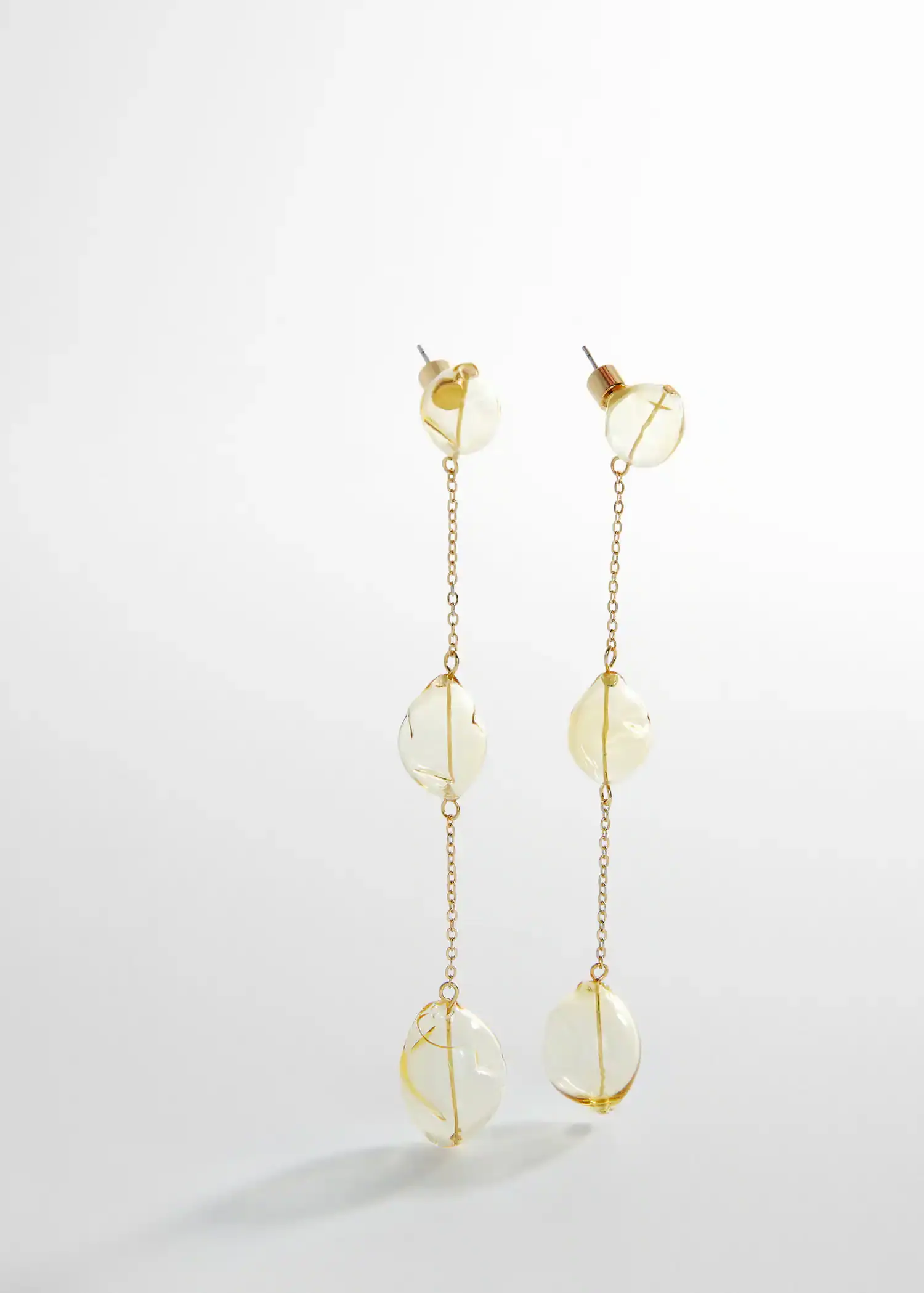 Mango Crystal thread earrings. a pair of earrings hanging from a chain. 