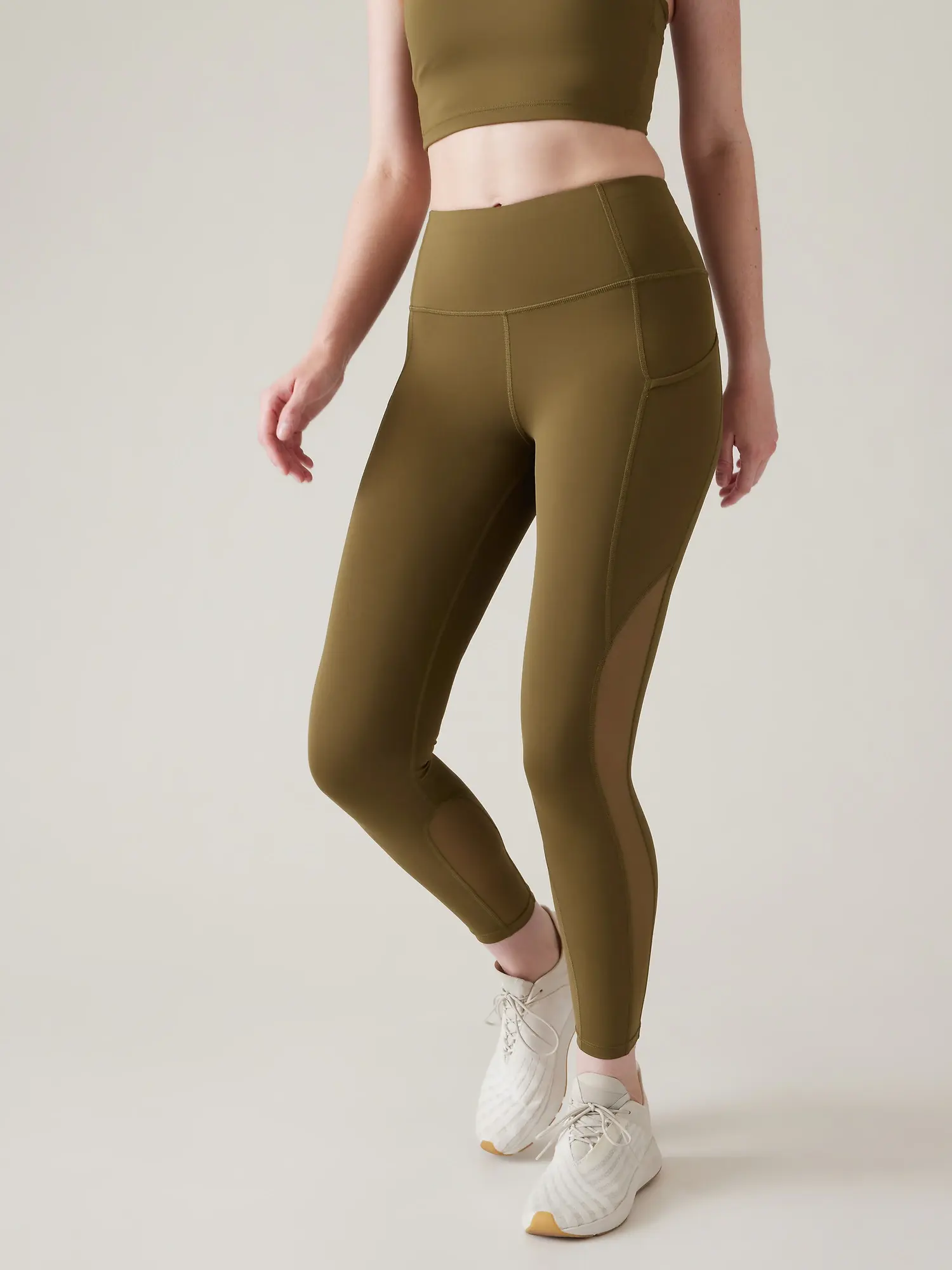 Athleta Ultimate Stash Mesh 7/8 Tight green. 1