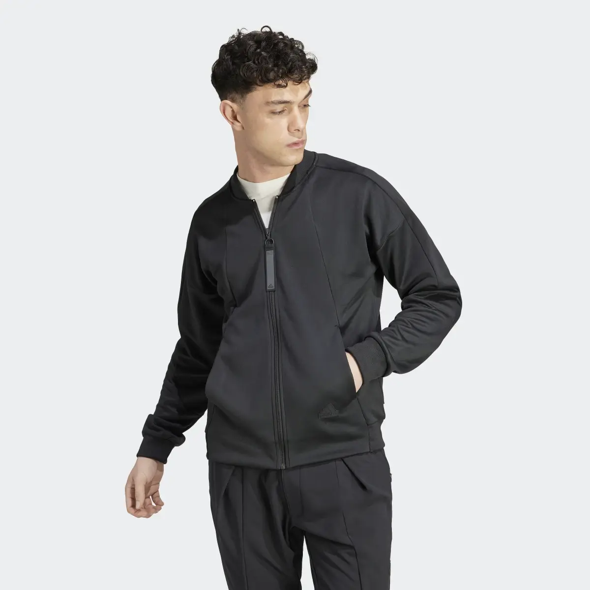 Adidas City Escape AEROREADY Warming Track Top. 2