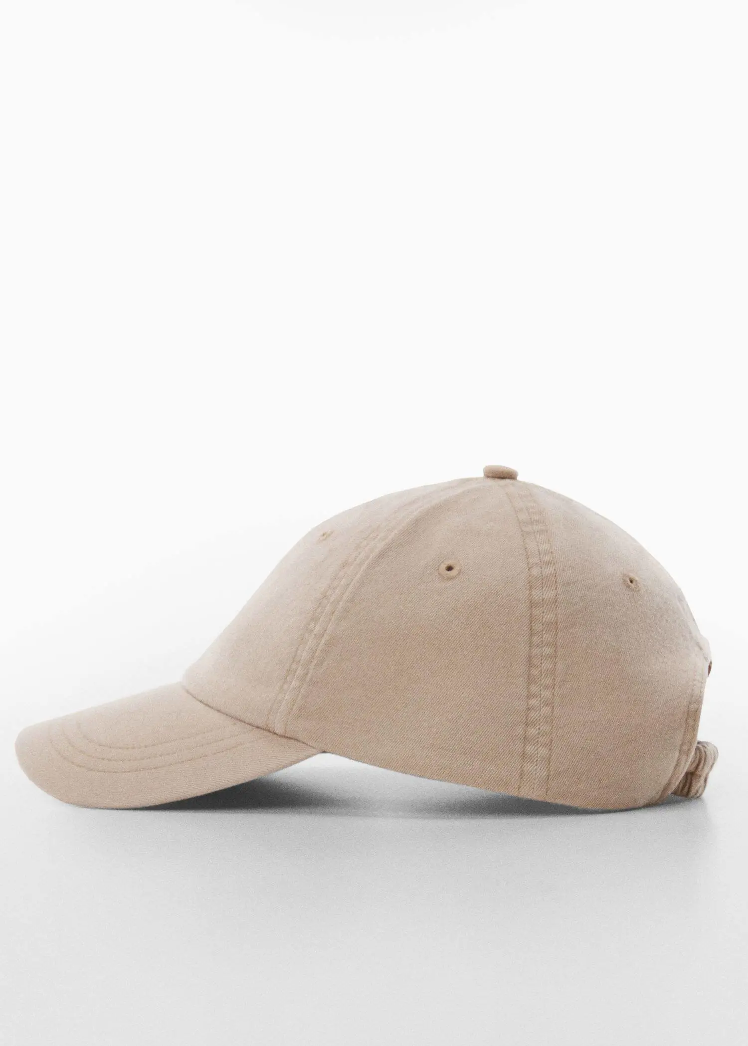 Mango Organic cotton cap. a beige hat is on a white surface. 