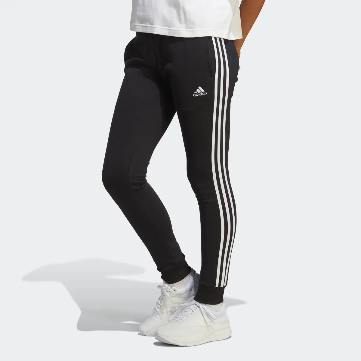 Adidas Essentials 3-Stripes French Terry Cuffed Pants. 1