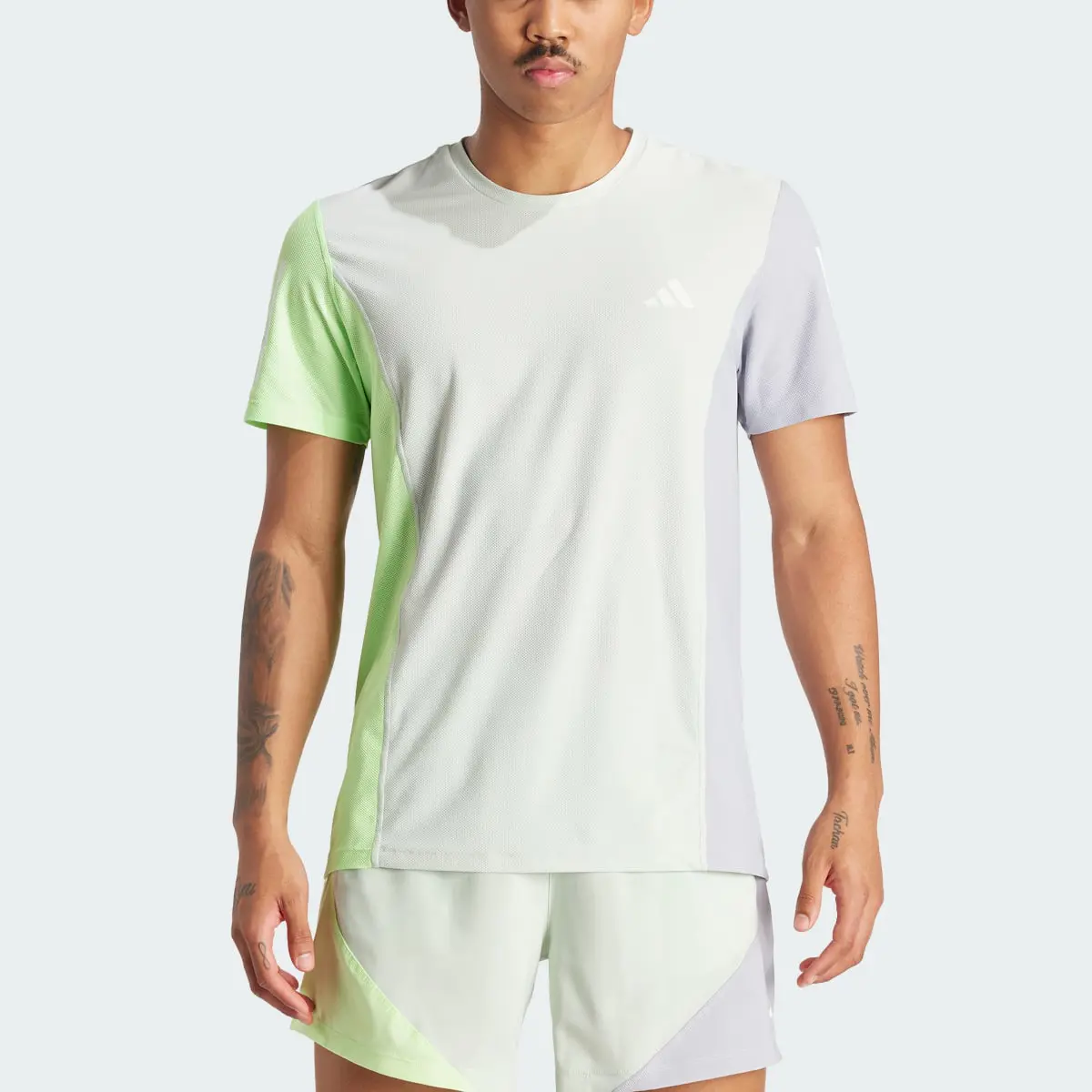 Adidas Playera Own The Run Colorblock. 1