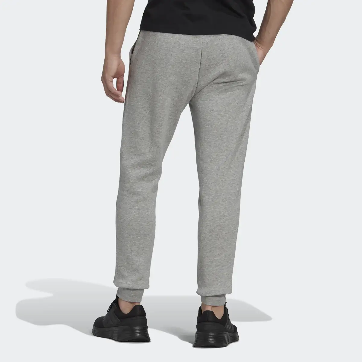 Adidas Essentials Fleece Regular Tapered Pants. 2